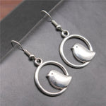 Vintage'owe kolczyki z ptasim charmsem – ręcznie robiona biżuteria boho